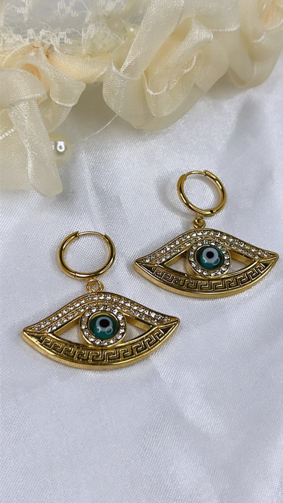 Boucle d’oreille العين