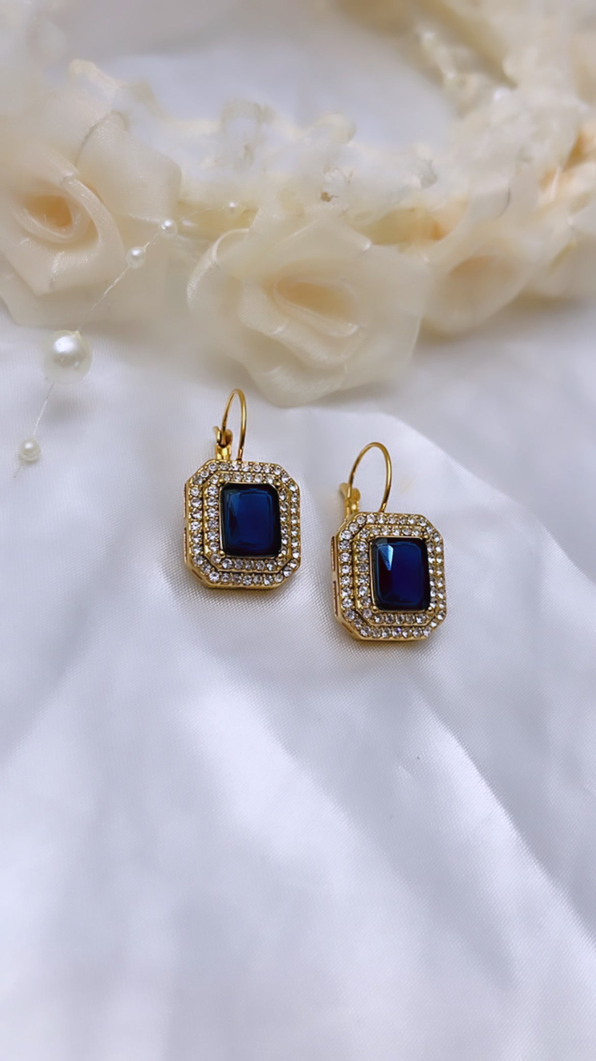 Boucle d’oreille avec perle blue